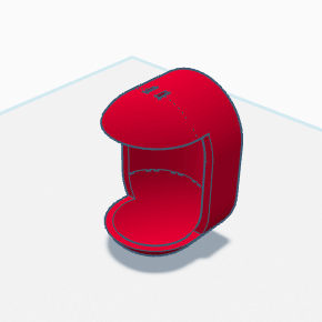 A 3D model of a red, open-faced door chime frame sits on a flat surface.